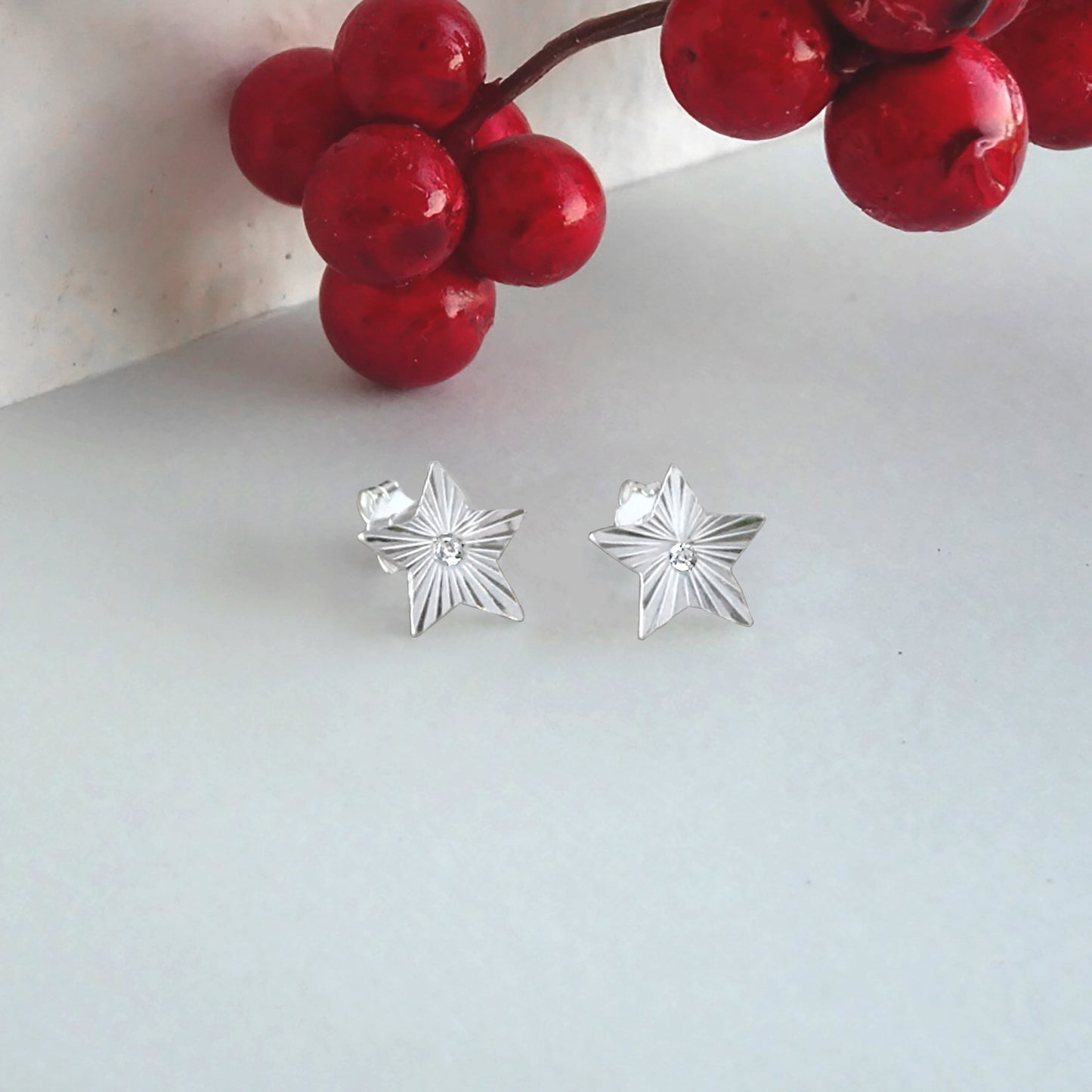 Sterling Silver Starburst Diamond Cut Clear CZ Stud Earrings