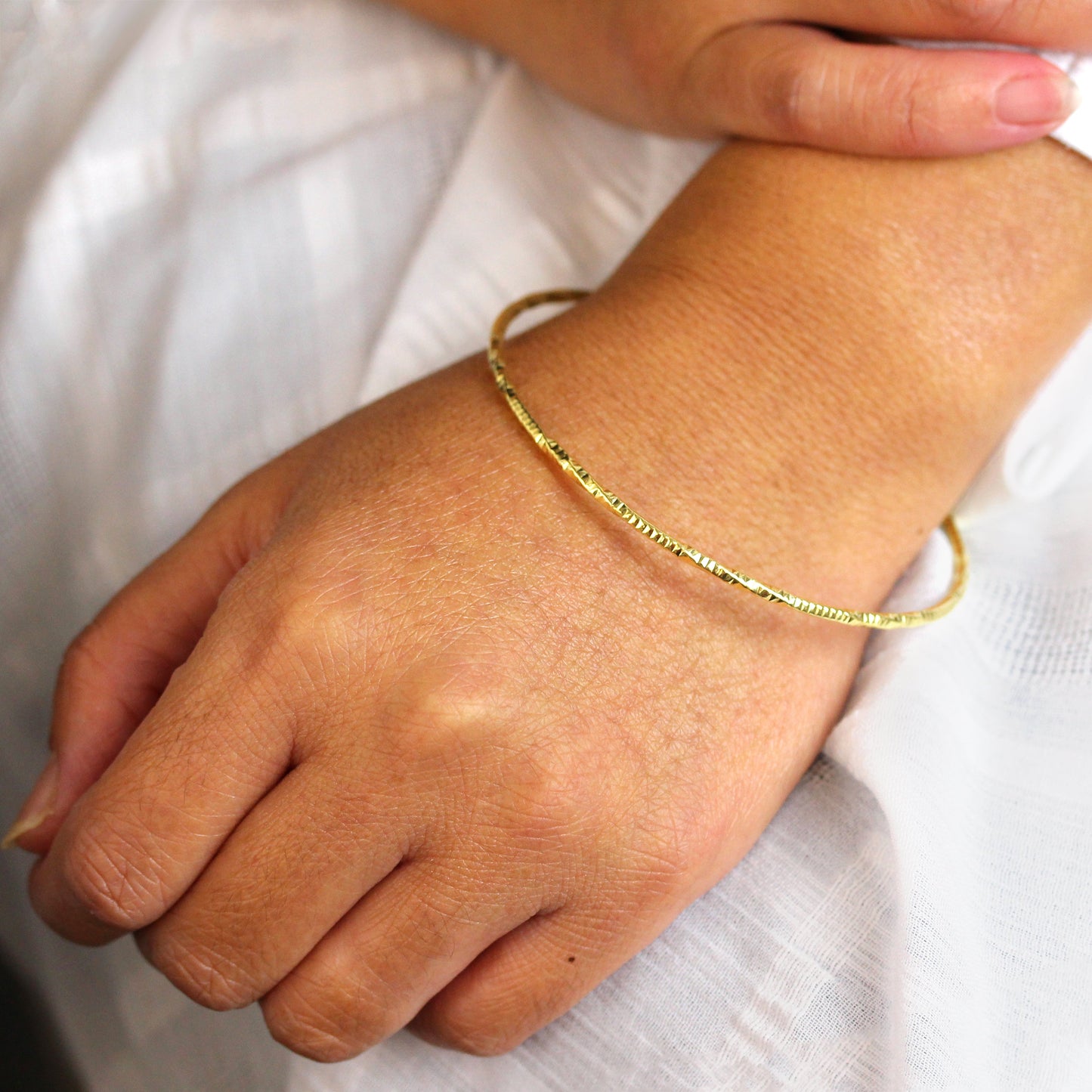 Gold Plated Sterling Silver Diamond Cut Twist Bangle