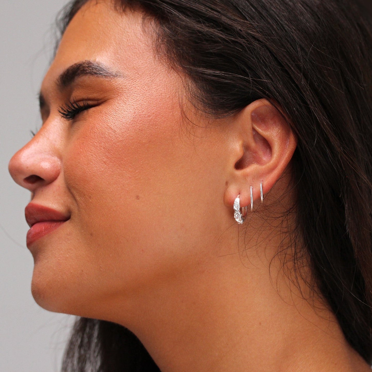 Sterling Silver CZ Triple Interlocking Huggie Hoop Earrings