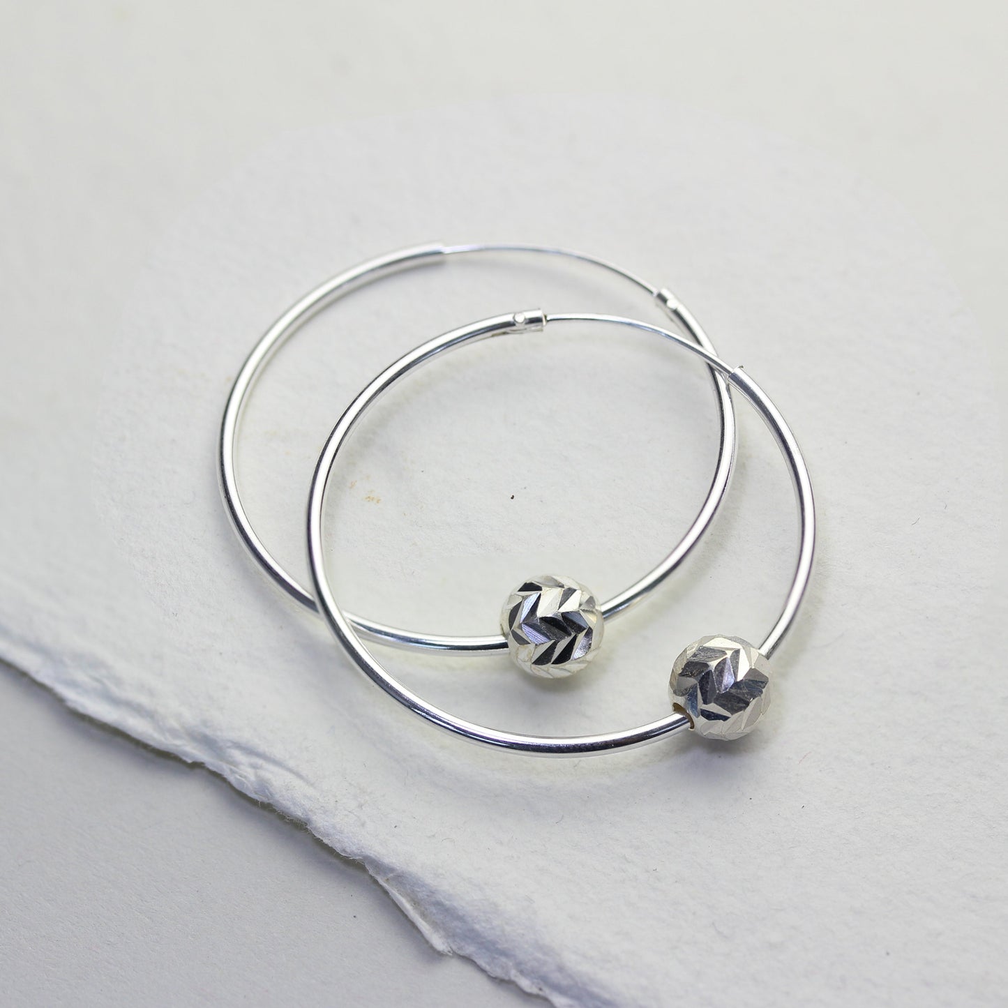 Sterling Silver 22mm Hoop Earrings with Chevron Cut Ball Beads