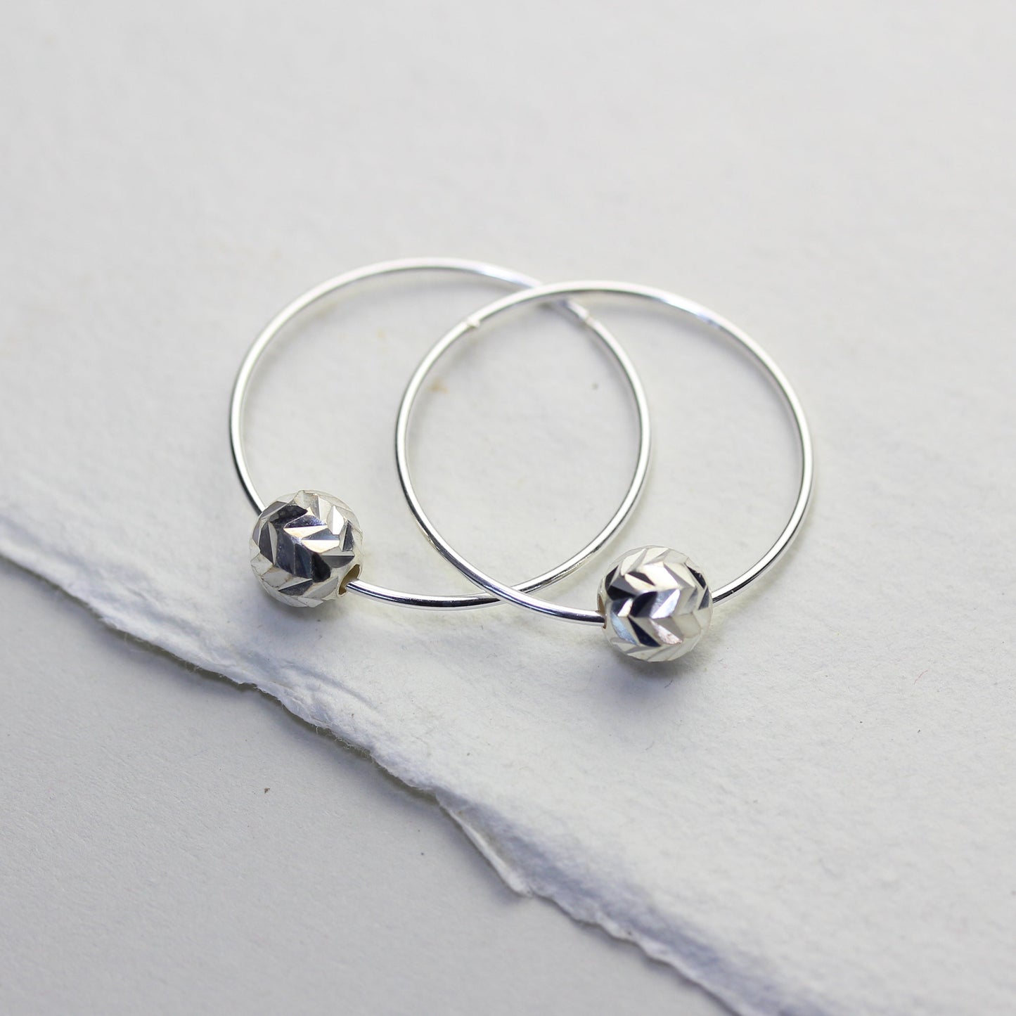 Sterling Silver 18mm Hoop Earrings with Chevron Cut Ball Beads