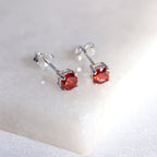 Sterling Silver Garnet CZ Birthstone Claw 4mm Stud Earrings
