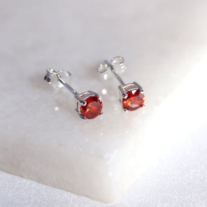 Sterling Silver Garnet CZ Birthstone Claw 4mm Stud Earrings