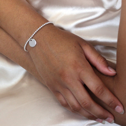 Sterling Silver Stretchy 6 Inch Bead Bracelet with Engravable Round Tag